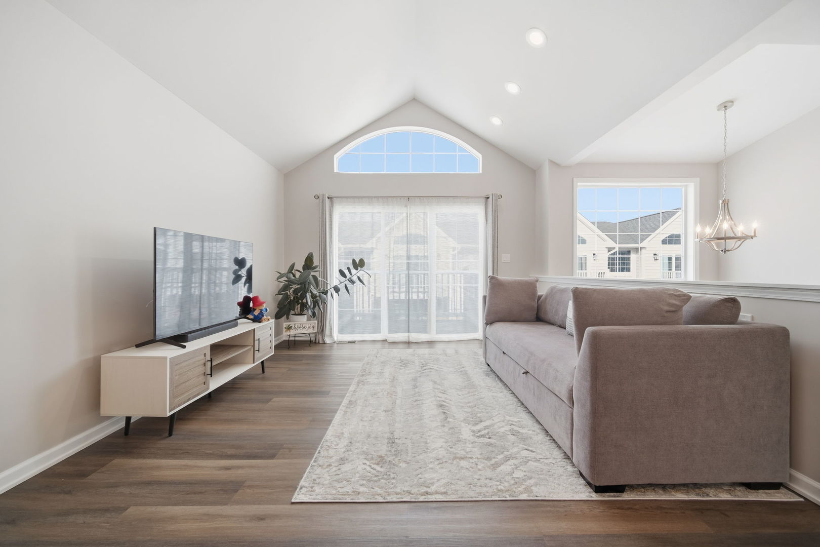 7214 Farmstead Lane Hanover Park, IL 60133 - Photo 5 of 30 a living room with furniture and a fireplace