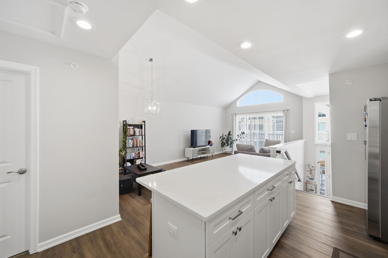 7214 Farmstead Lane Hanover Park, IL 60133 - Photo 10 of 30 a kitchen with a sink a stove and a refrigerator