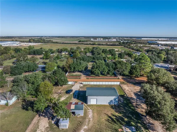 an aerial view of a house with a garden