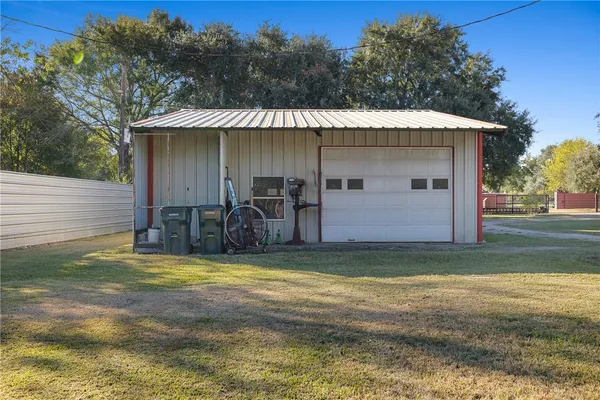 a view of a back yard of the house
