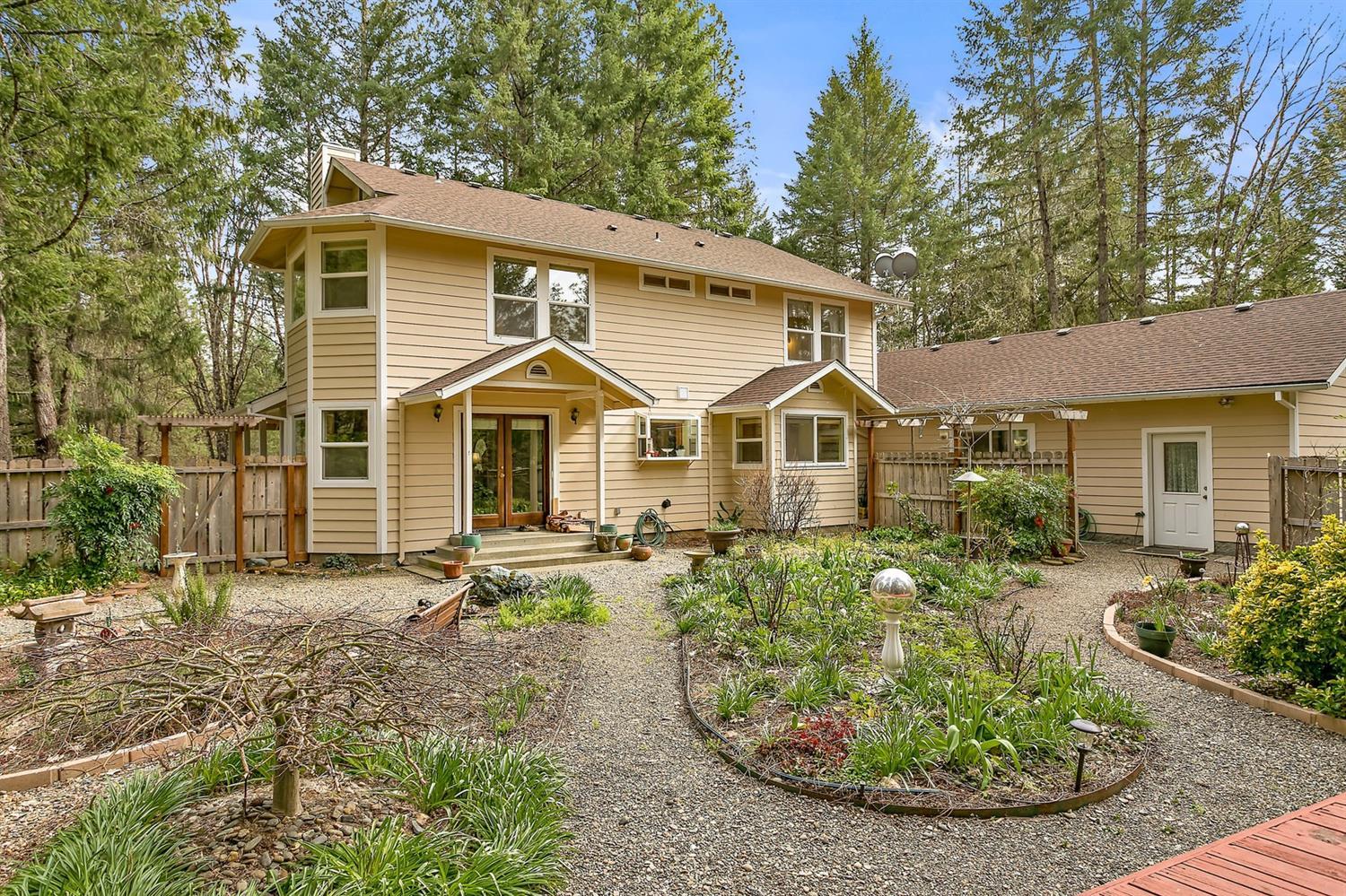 1000 Crow Road Merlin, OR 97532 - Photo 11 of 31 a view of a house with backyard