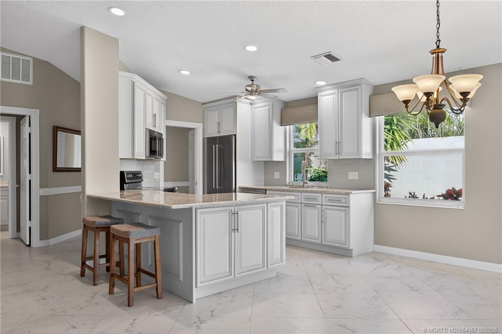 1687 Southwest Springfield Court Palm City, FL 34990 - Photo 12 of 34 An abundance of cabinet space