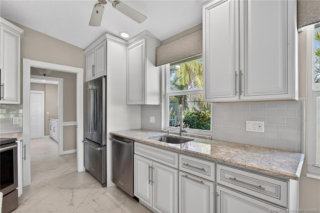 1687 Southwest Springfield Court Palm City, FL 34990 - Photo 15 of 34 Screened lanai