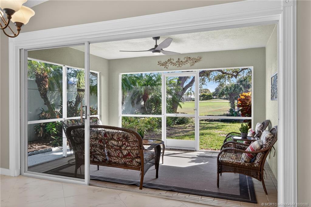 1687 Southwest Springfield Court Palm City, FL 34990 - Photo 17 of 34 Screened lanai. Privacy abounds.