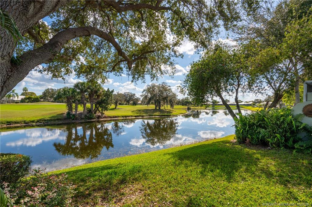 1687 Southwest Springfield Court Palm City, FL 34990 - Photo 2 of 34 Watch birds play or golfers on Monarch's course