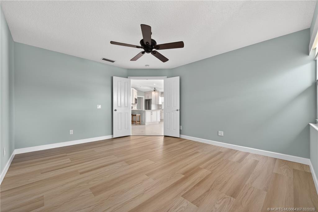 1687 Southwest Springfield Court Palm City, FL 34990 - Photo 21 of 34 Main Bedroom. 2 closets.