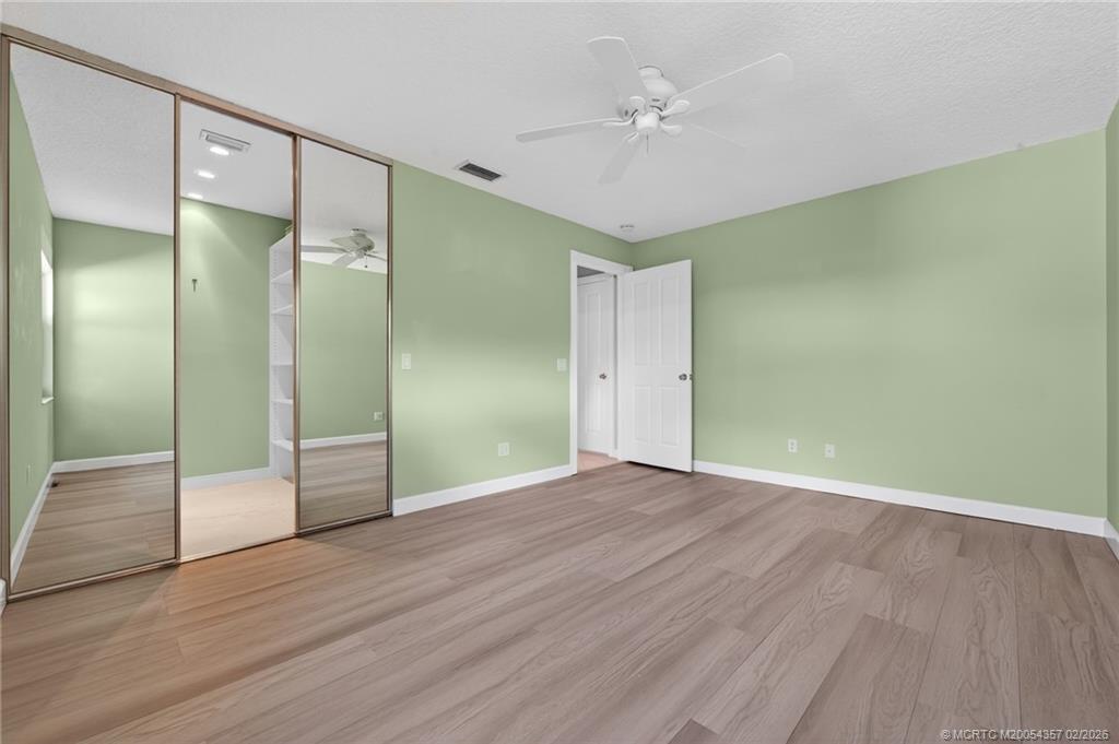 1687 Southwest Springfield Court Palm City, FL 34990 - Photo 25 of 34 Privacy for all with 2 master suites.