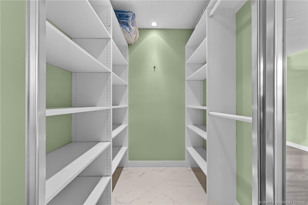 1687 Southwest Springfield Court Palm City, FL 34990 - Photo 26 of 34 Walk-in closet