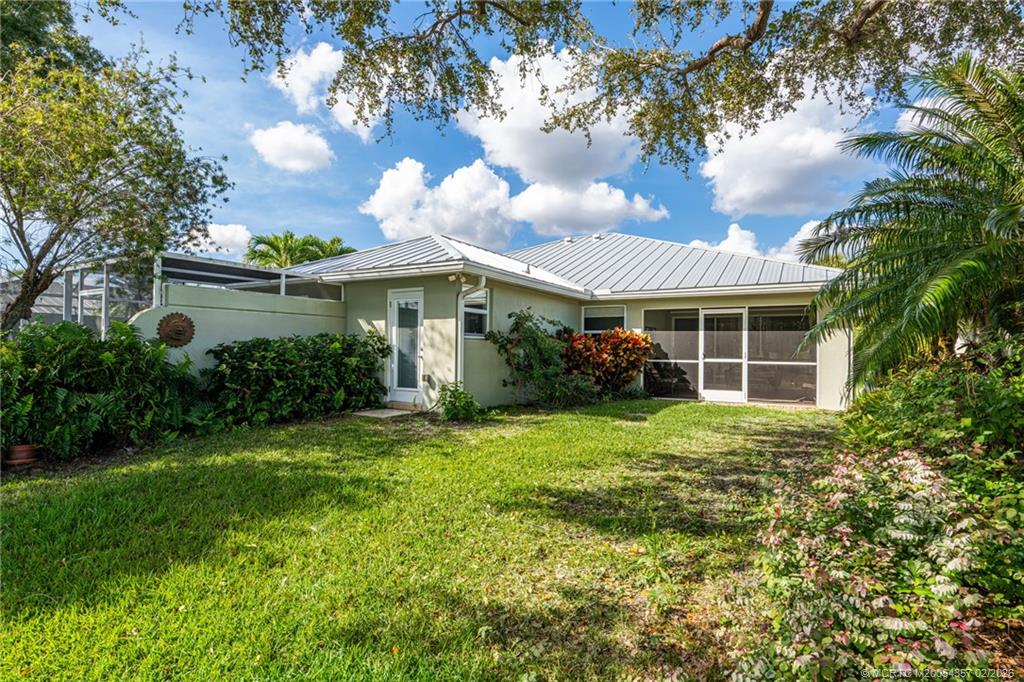 1687 Southwest Springfield Court Palm City, FL 34990 - Photo 29 of 34 Exterior rear view