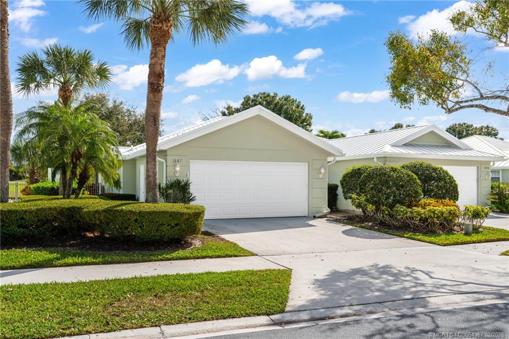 1687 Southwest Springfield Court Palm City, FL 34990 - Photo 3 of 34 Beautifully remodeled 2 bedroom, 2 bath, 2 car garage villa.