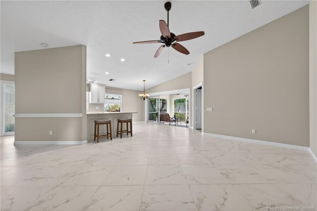 1687 Southwest Springfield Court Palm City, FL 34990 - Photo 10 of 34 Wonderful kitchen with light colored cabinetry
