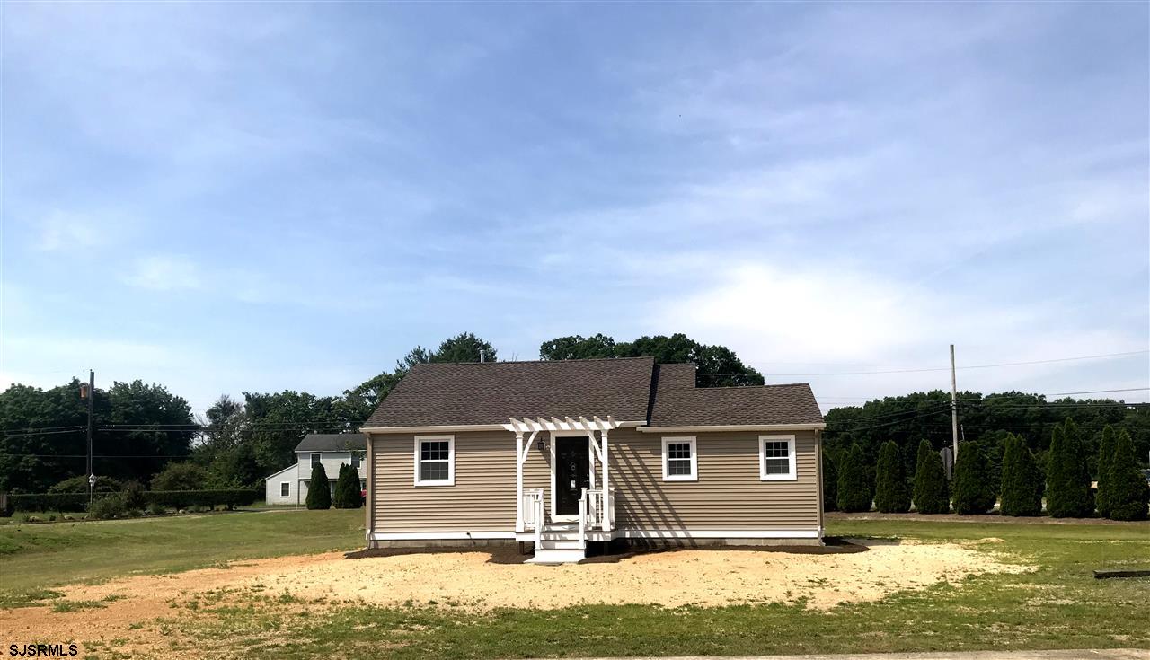 513 Perry Road Woodbine, NJ 08270 - Photo 1 of 1 a front view of a house with a yard