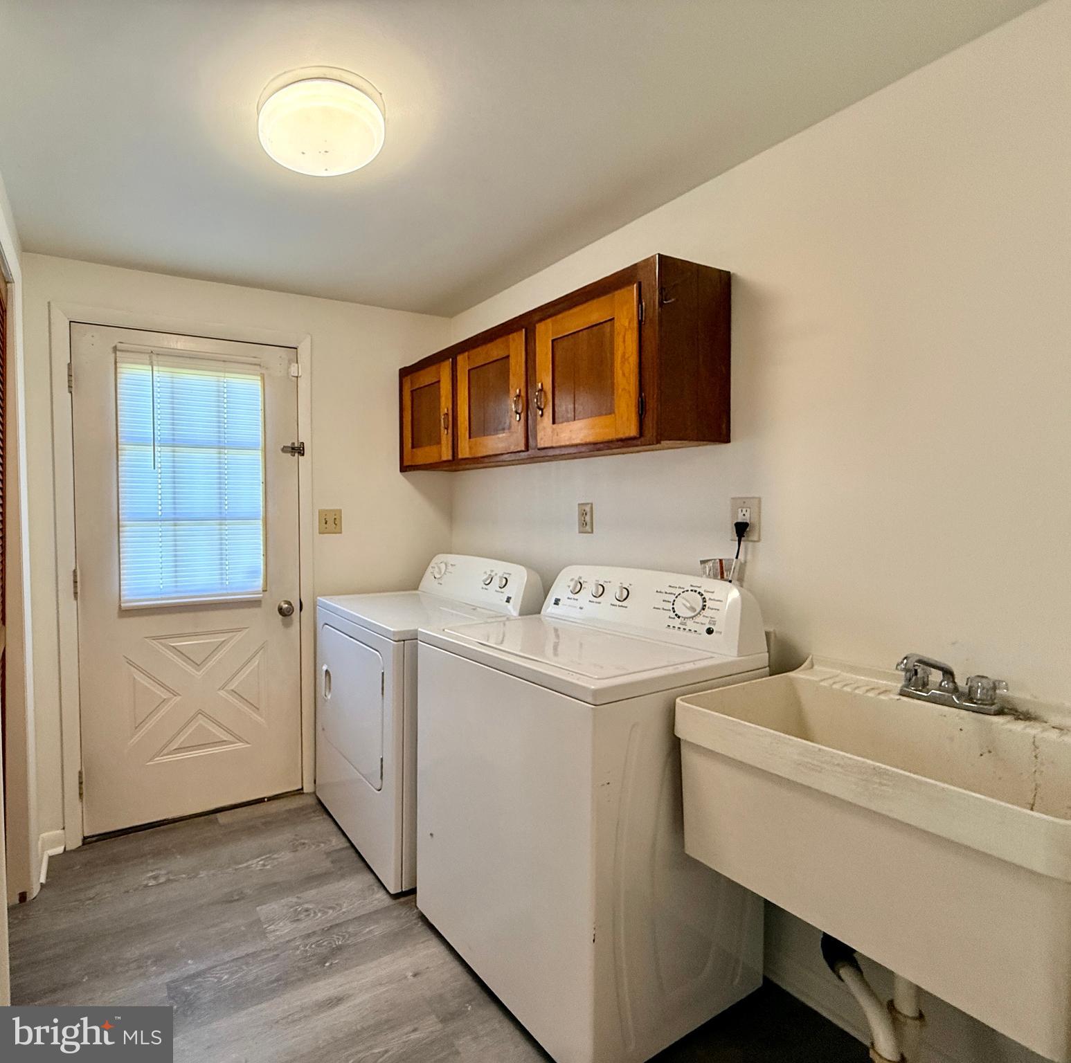 225 East 2nd Avenue Ranson, WV 25438 - Photo 17 of 35 Laundry rm. with utility sink & exterior door