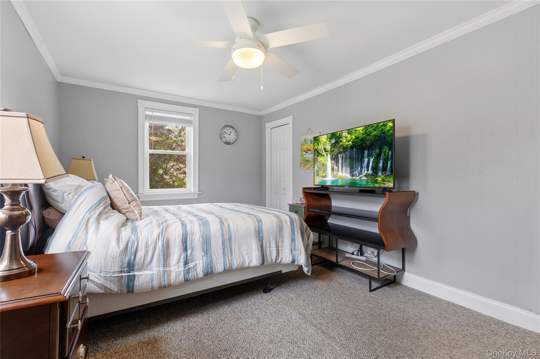 25 West Branch Road Mahopac, NY 10541 - Photo 11 of 21 a bedroom with a bed chair and a window