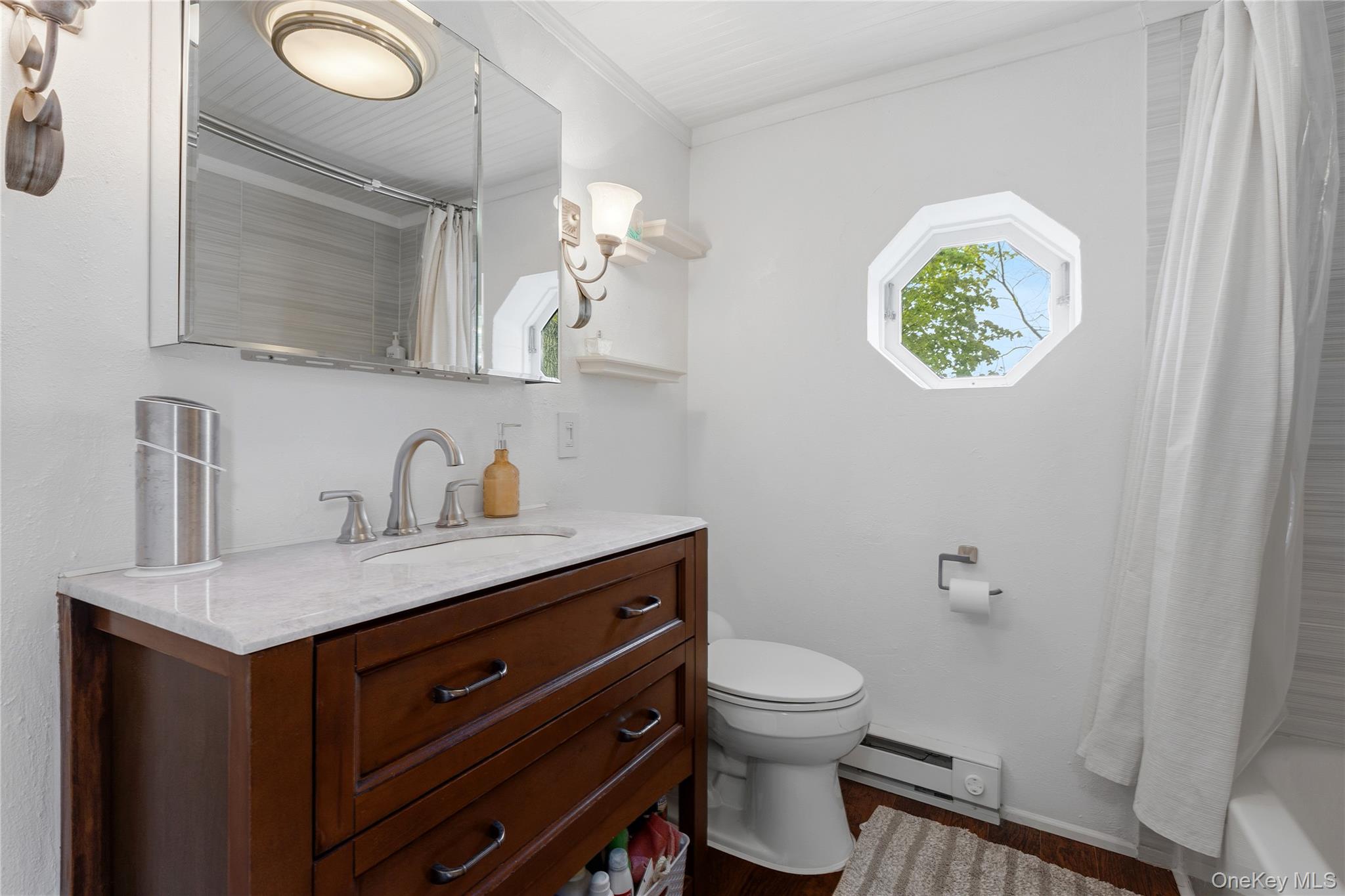 25 West Branch Road Mahopac, NY 10541 - Photo 14 of 21 a bathroom with a granite countertop sink a toilet and a mirror