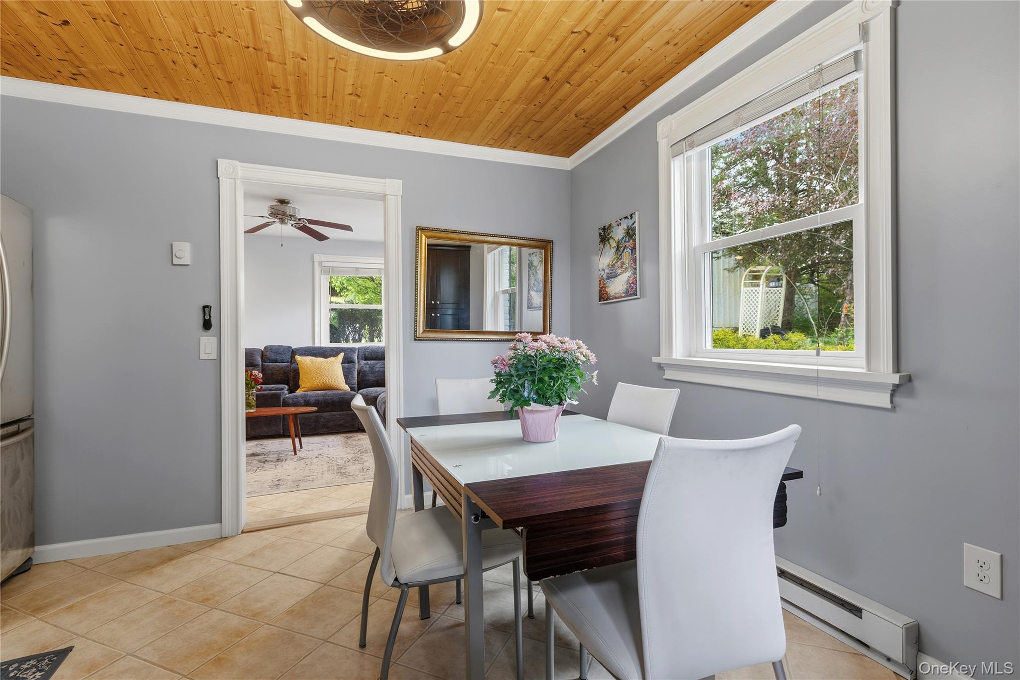 25 West Branch Road Mahopac, NY 10541 - Photo 8 of 21 a view of a dining room with furniture window and wooden floor