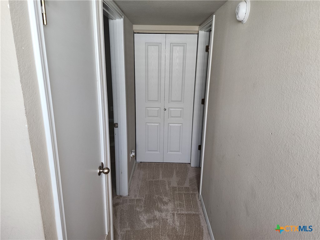 330 Trestle Tree, Unit 22 San Marcos, TX 78666 - Photo 17 of 33 a view of a livingroom with wooden floor