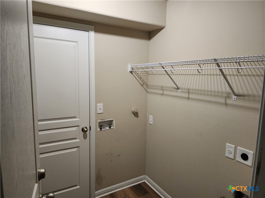 330 Trestle Tree, Unit 22 San Marcos, TX 78666 - Photo 8 of 33 a view of storage and utility room with racks on the wall