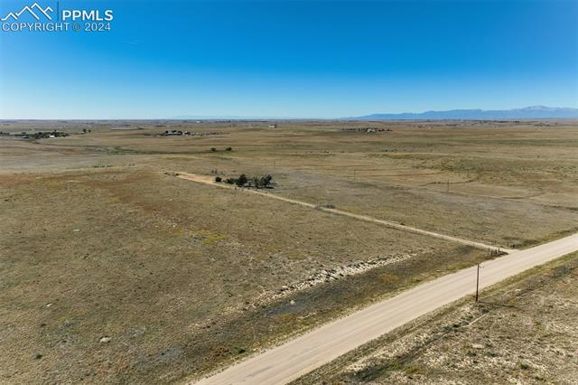 22309 Murphy Road Peyton, CO 80831 - Photo 3 of 16 Birds eye view of property with a mountain view and a rural view