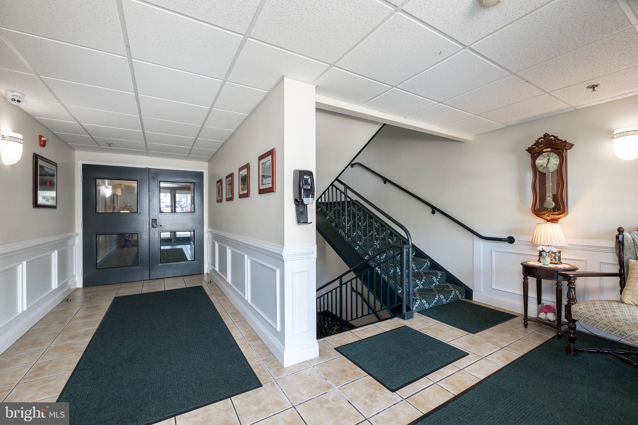 453 Brandon Road Eagleville, PA 19403 - Photo 3 of 36 Wainscoting adds elegance to the hallways