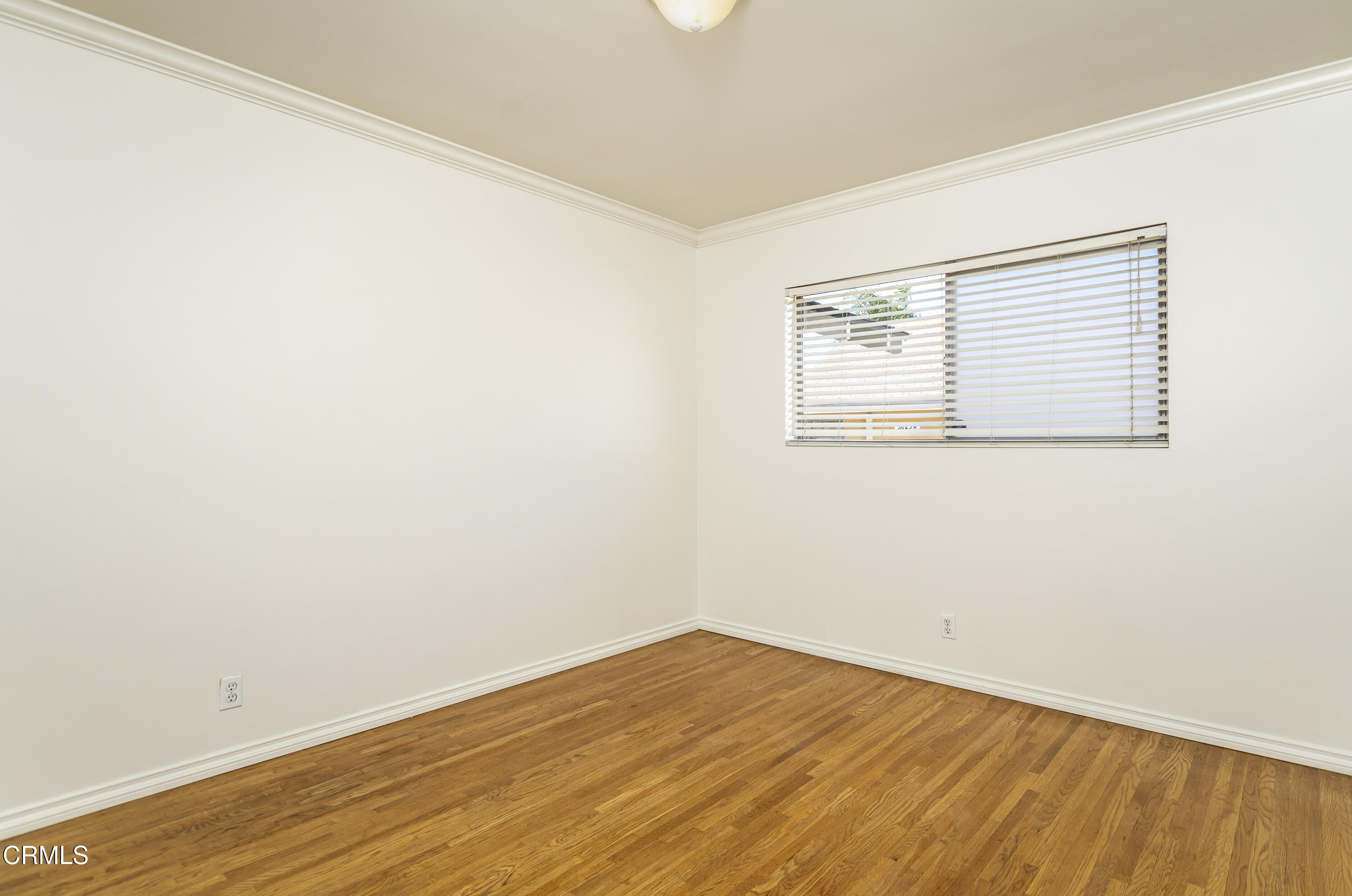3021 Ashwin Drive, Unit B La Crescenta, CA 91214 - Photo 12 of 20 an empty room with wooden floor and windows