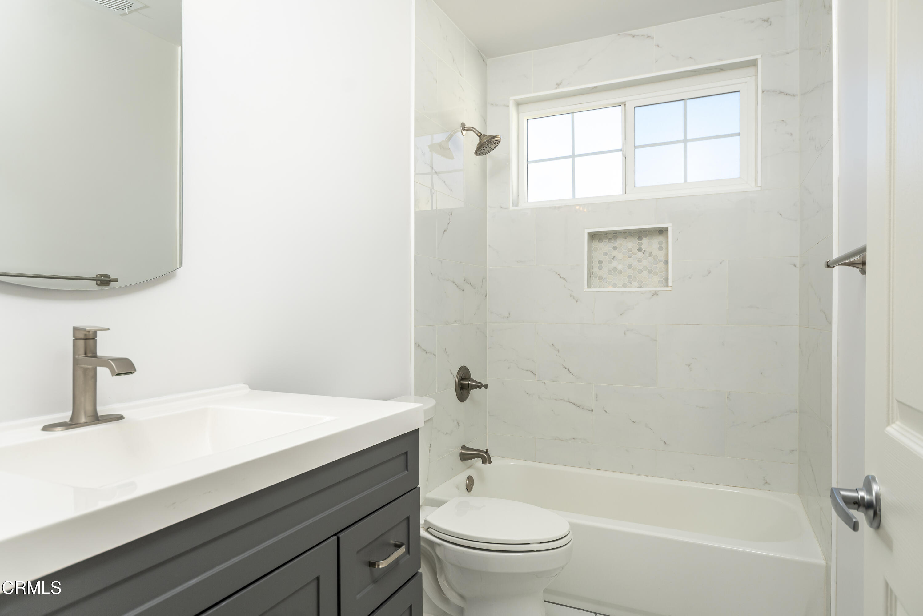 3021 Ashwin Drive, Unit B La Crescenta, CA 91214 - Photo 14 of 20 a bathroom with a sink a toilet and shower