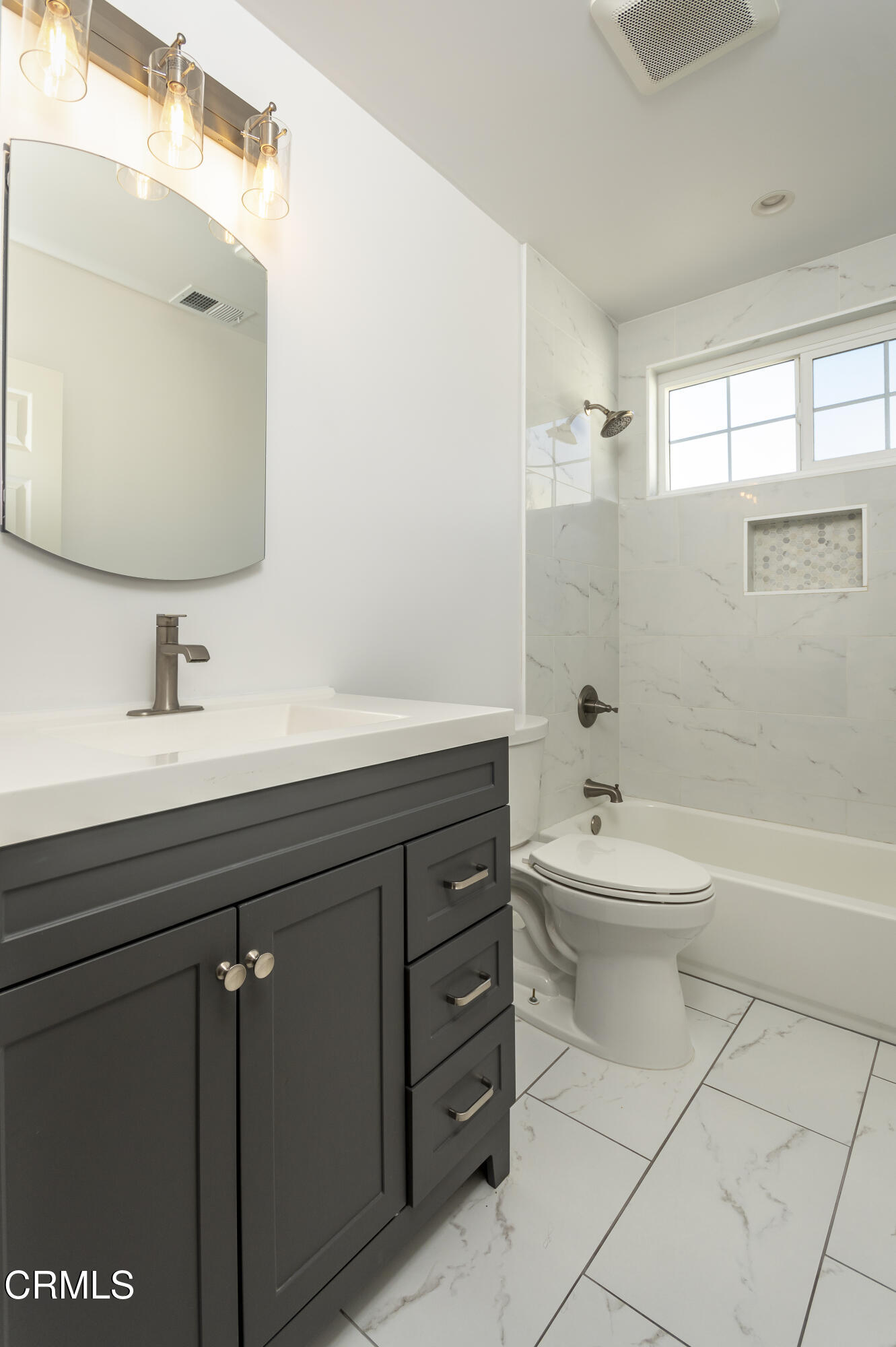3021 Ashwin Drive, Unit B La Crescenta, CA 91214 - Photo 16 of 20 a bathroom with a double vanity sink toilet mirror and bathtub