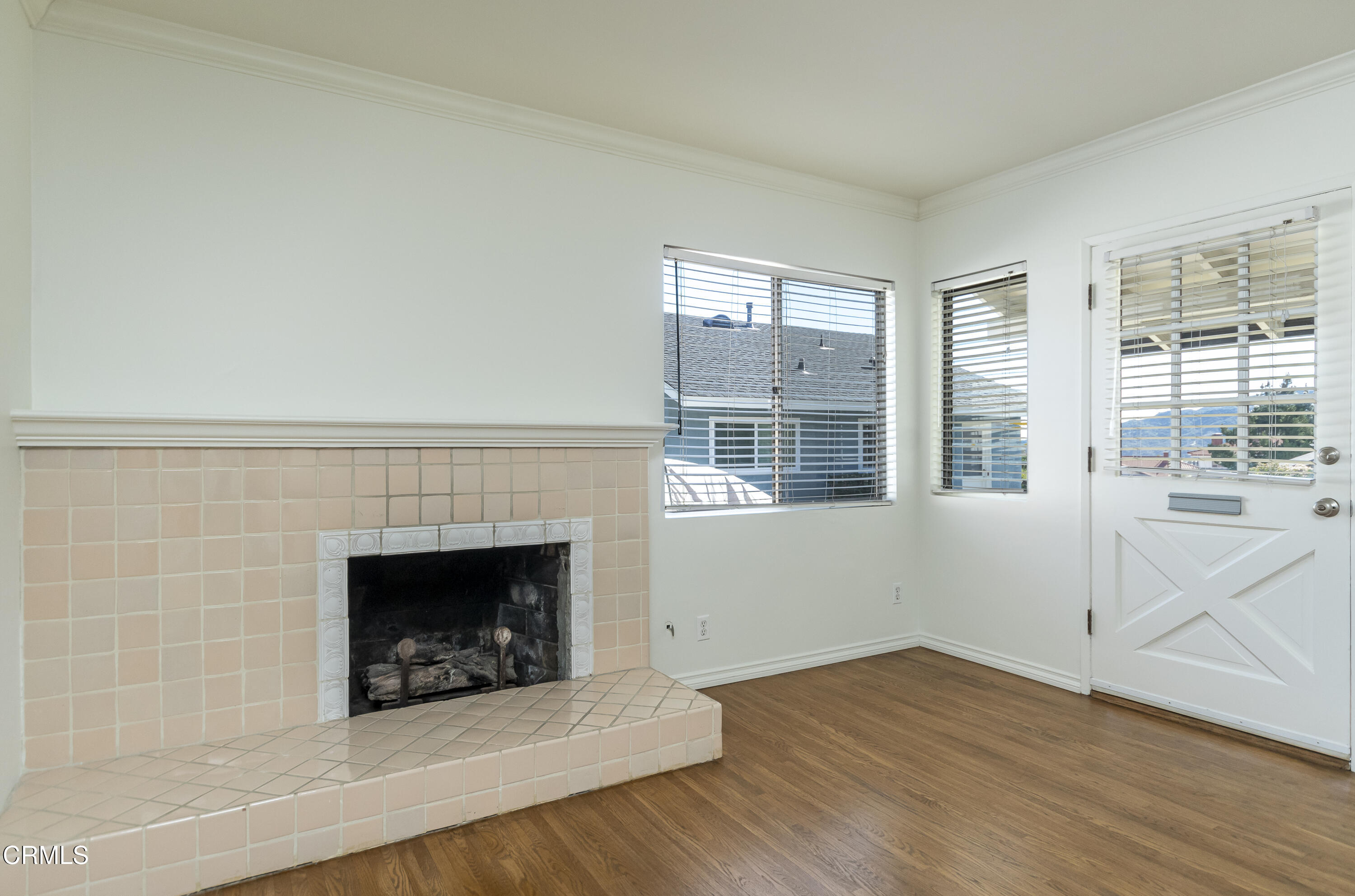 3021 Ashwin Drive, Unit B La Crescenta, CA 91214 - Photo 5 of 20 an empty room with wooden floor and fireplace