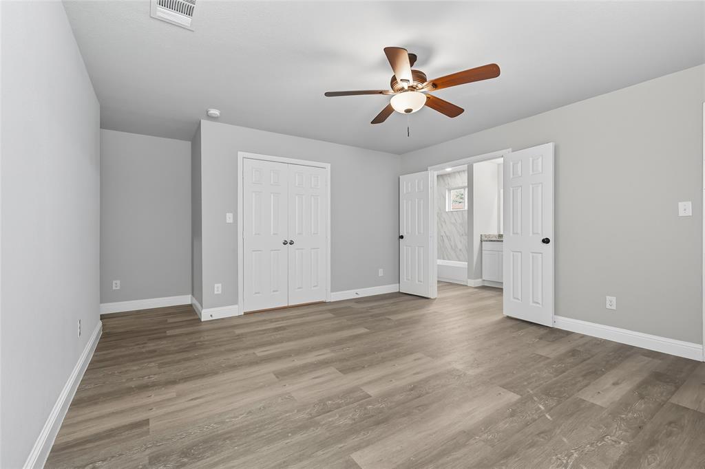 3151 Stag Road Dallas, TX 75241 - Photo 8 of 19 a view of an empty room with wooden floor