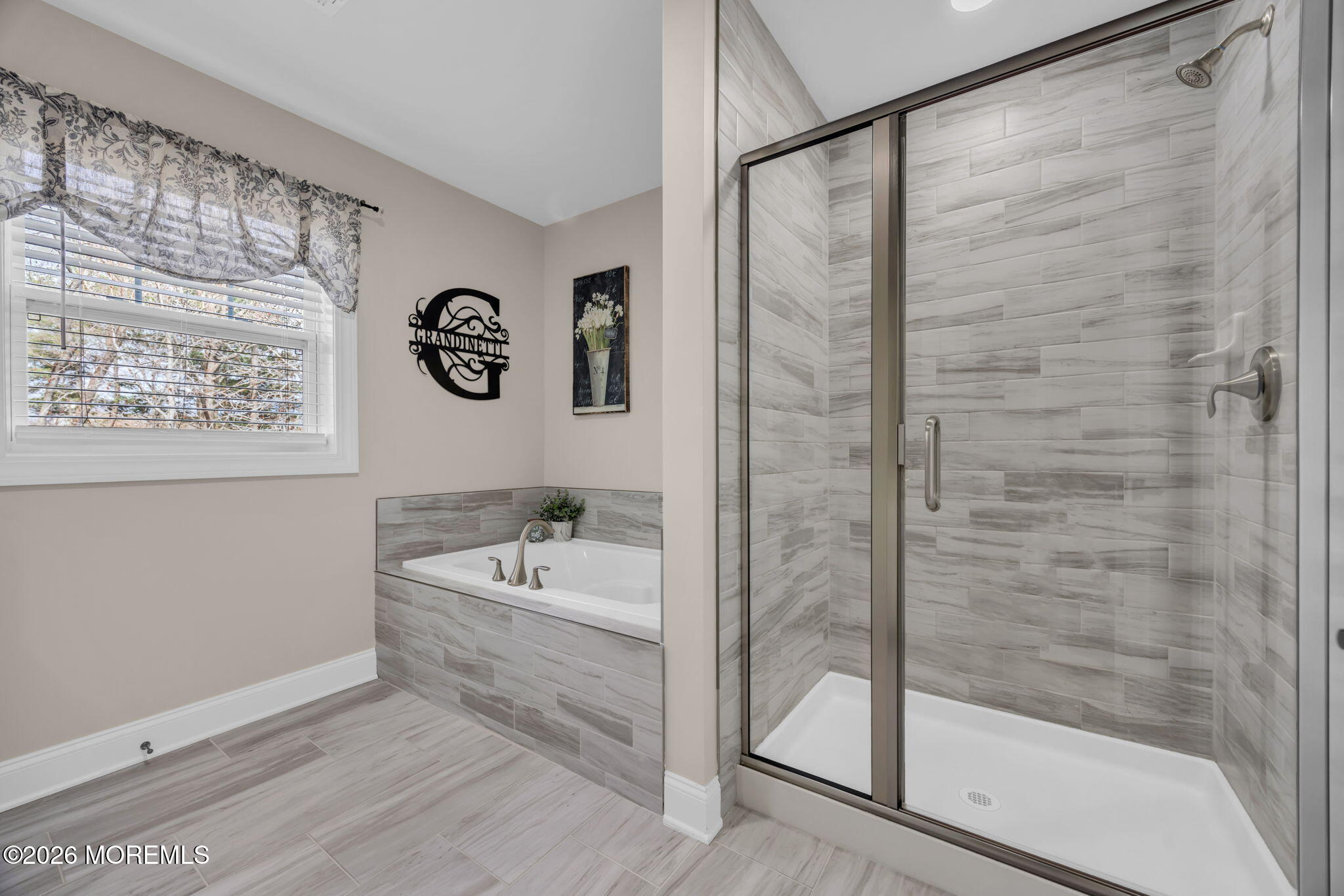 10 Tasha Lane Howell, NJ 07731 - Photo 17 of 44 a bathroom with a bathtub and a shower