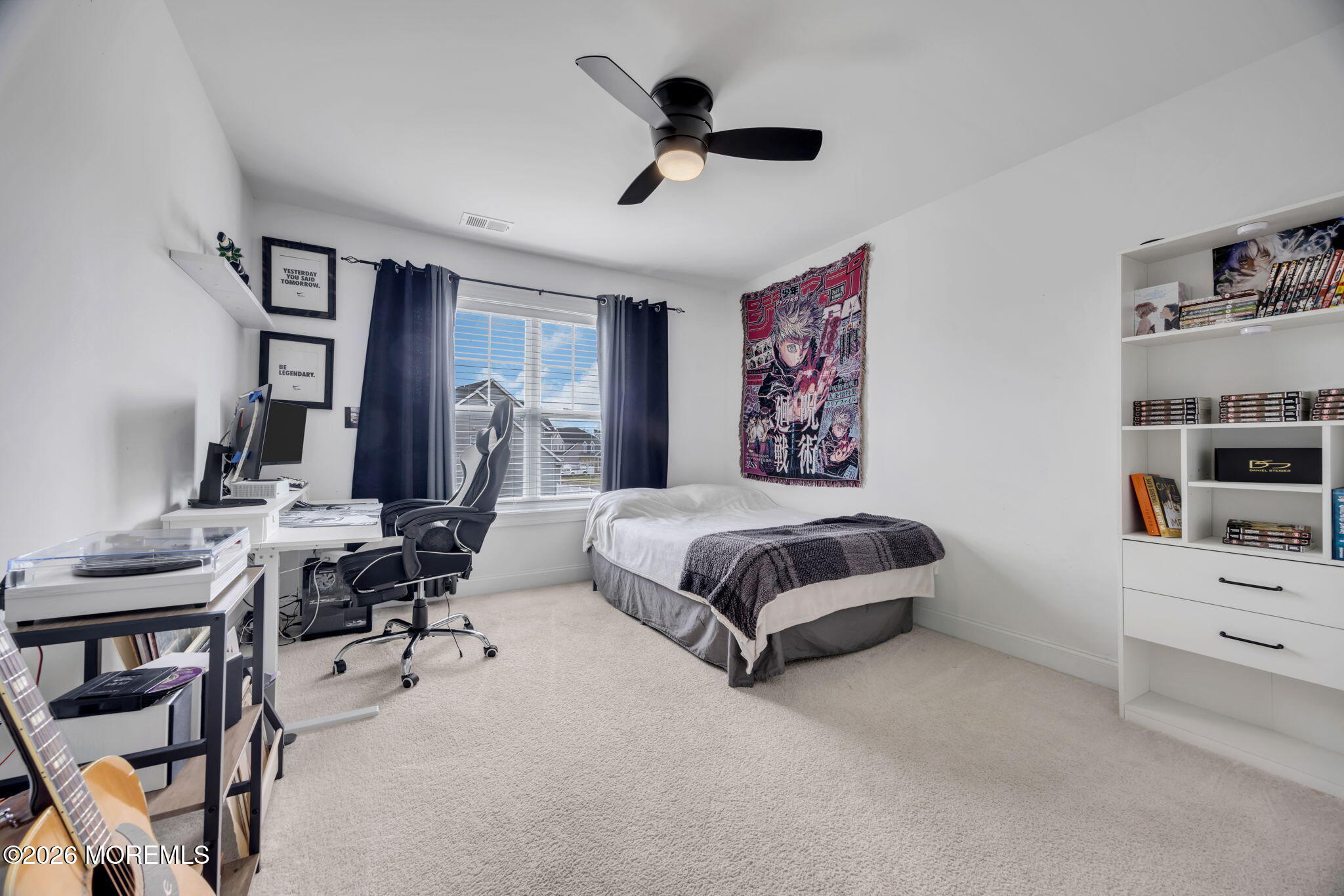 10 Tasha Lane Howell, NJ 07731 - Photo 19 of 44 a bedroom with furniture and a chandelier