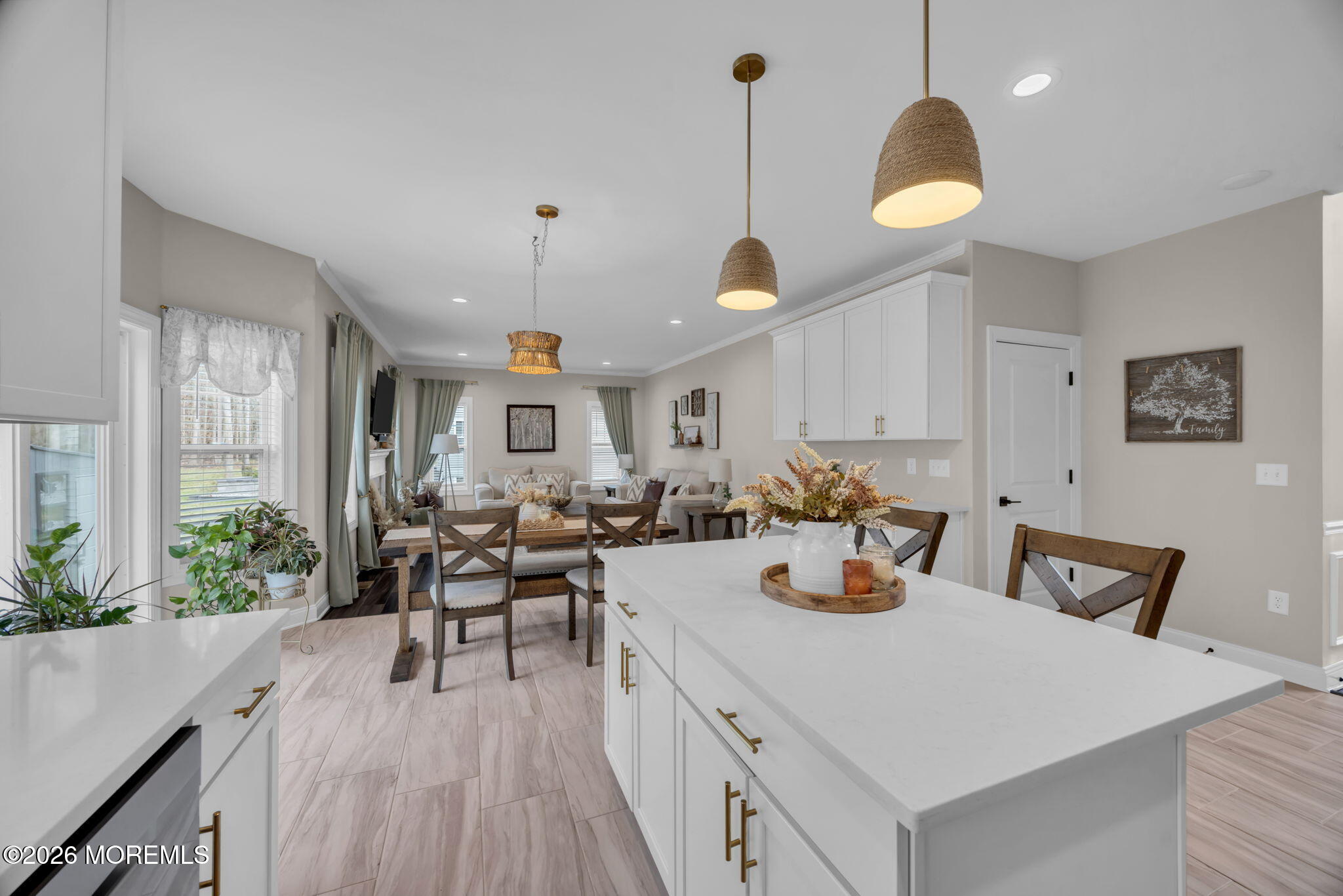 10 Tasha Lane Howell, NJ 07731 - Photo 26 of 44 a view of a dining room and livingroom with furniture wooden floor a chandelier