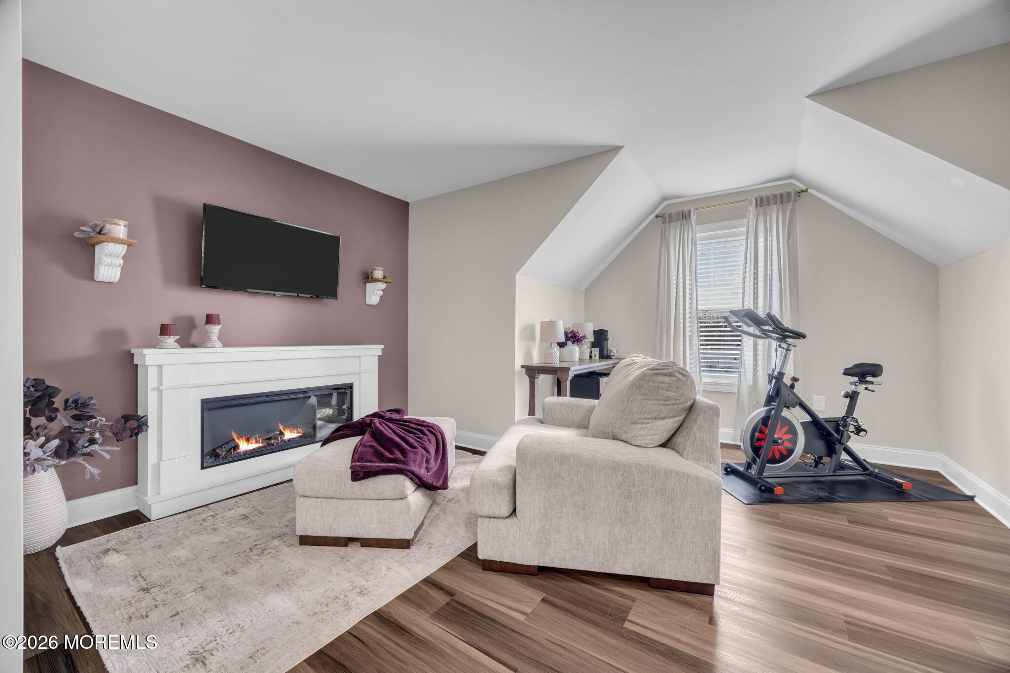 10 Tasha Lane Howell, NJ 07731 - Photo 35 of 44 a living room with furniture and a fireplace