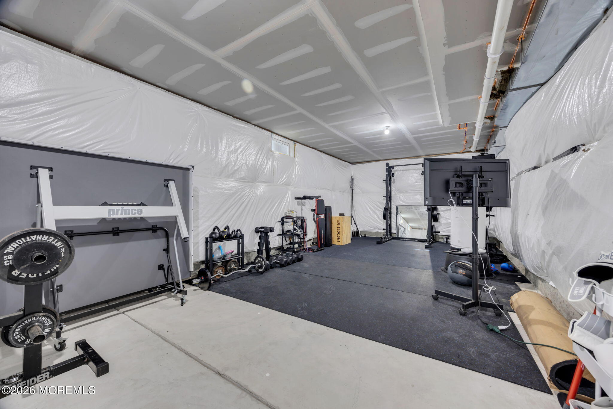 10 Tasha Lane Howell, NJ 07731 - Photo 40 of 44 a view of a room with gym equipment