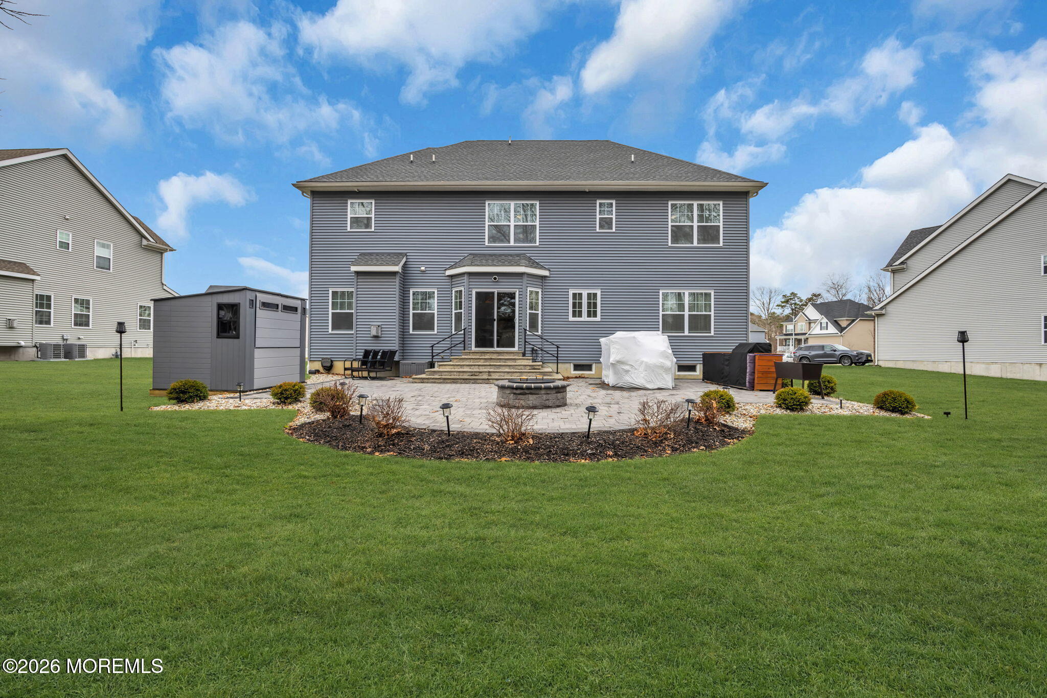 10 Tasha Lane Howell, NJ 07731 - Photo 41 of 44 a front view of a house with a garden