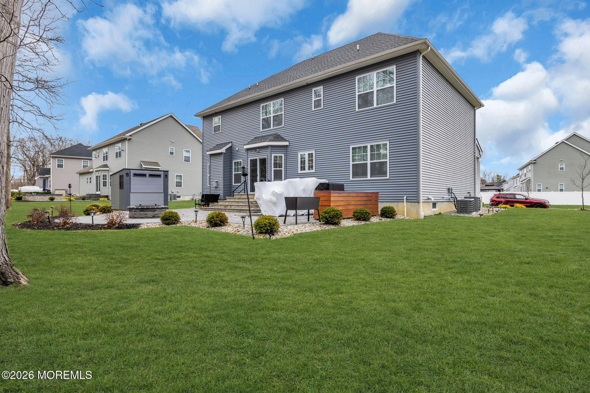 10 Tasha Lane Howell, NJ 07731 - Photo 43 of 44 a front view of house with yard and green space