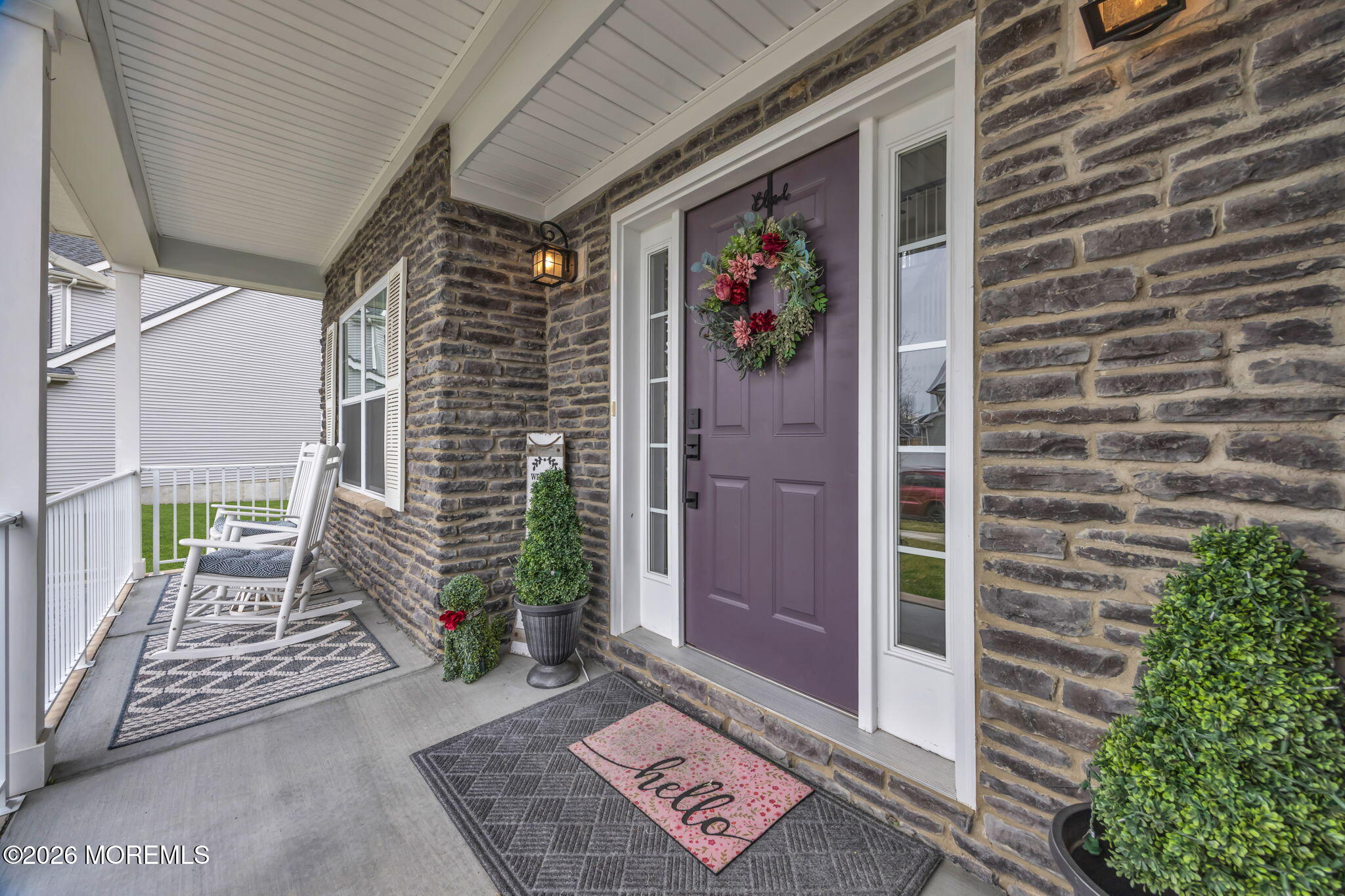 10 Tasha Lane Howell, NJ 07731 - Photo 7 of 44 a front view of a house with a potted plant