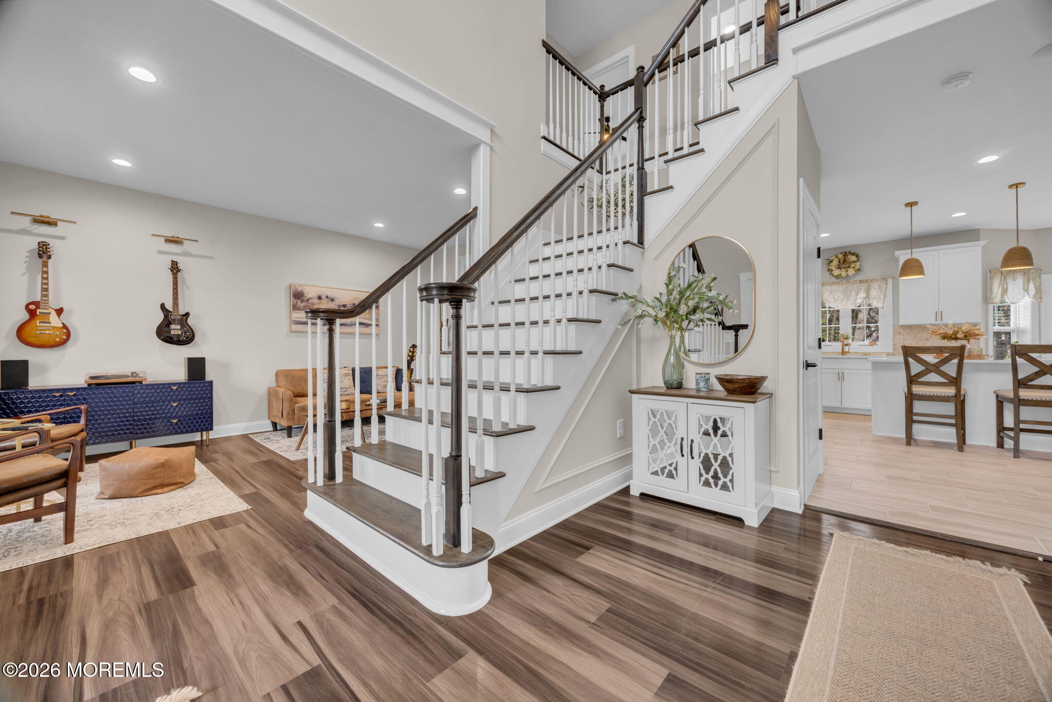 10 Tasha Lane Howell, NJ 07731 - Photo 9 of 44 a view of entryway livingroom and hall with wooden floor