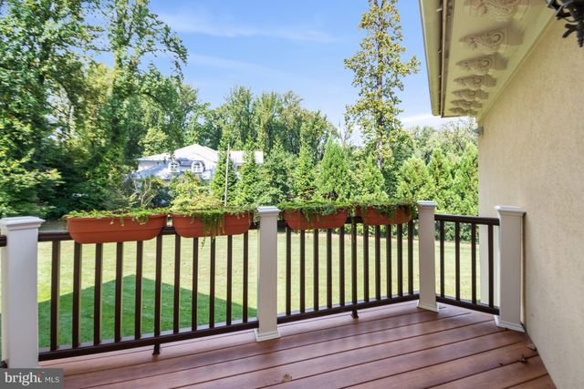 a view of a wooden fence