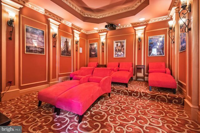 a room with furniture and a flat screen tv