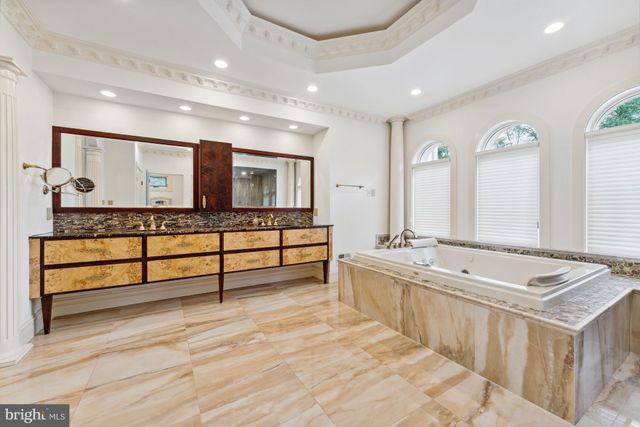 a bedroom with a bed and a table