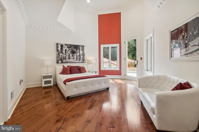 a bathroom with a tub sink and shower