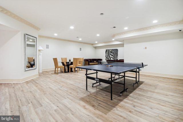 a view of an outside dining space with furniture