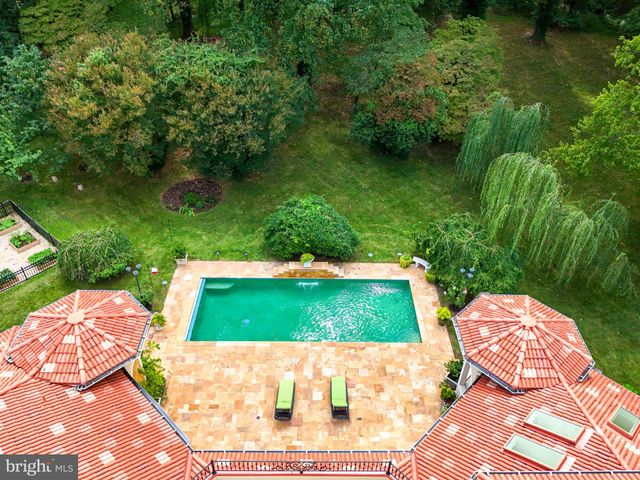 an aerial view of a swimming pool