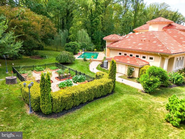 aerial view of a house with garden