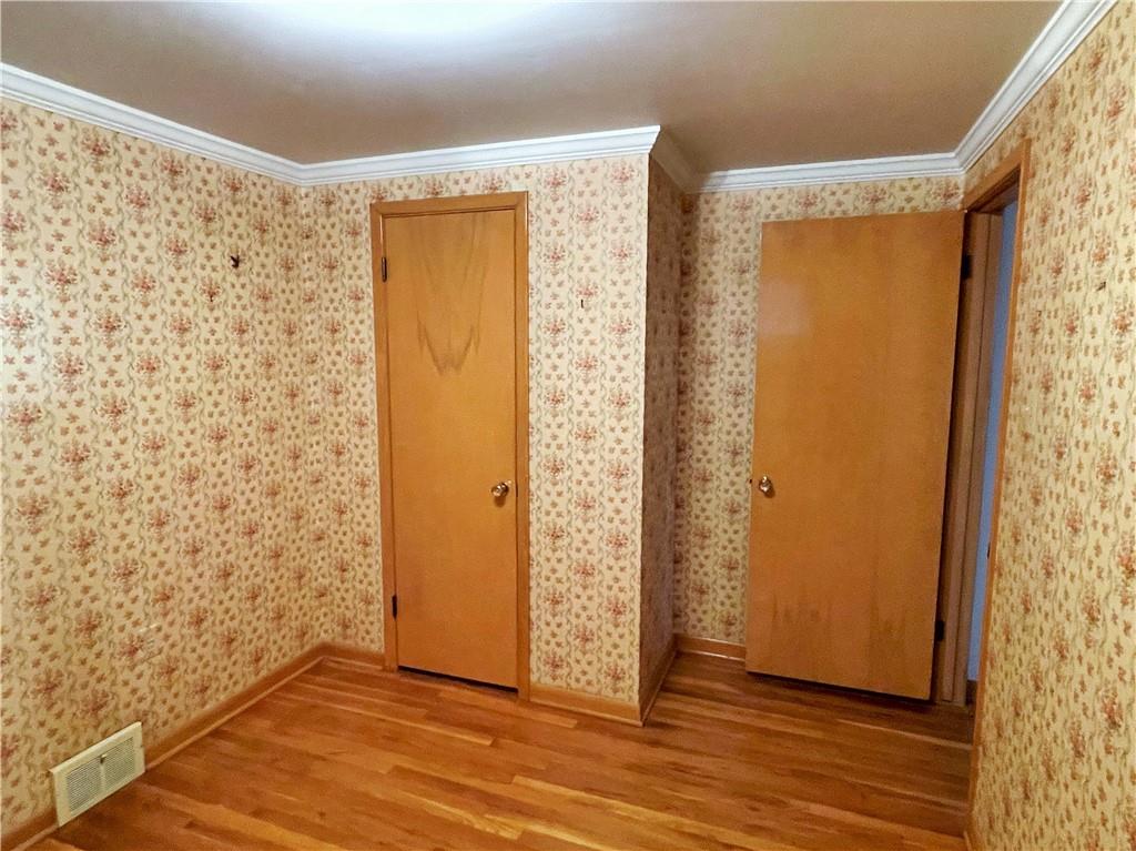 2310 North Forest Grove Road Coraopolis, PA 15108 - Photo 20 of 50 a view of a bathroom with wooden floor and a shower