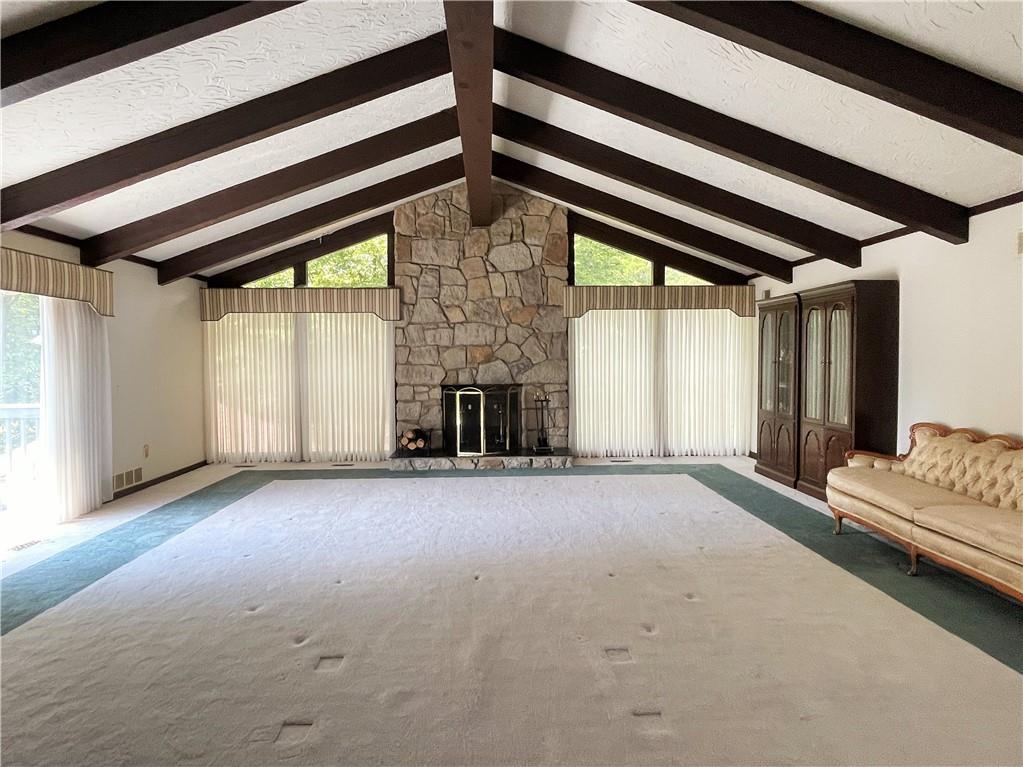 2310 North Forest Grove Road Coraopolis, PA 15108 - Photo 2 of 50 a view of a livingroom with fireplace and window