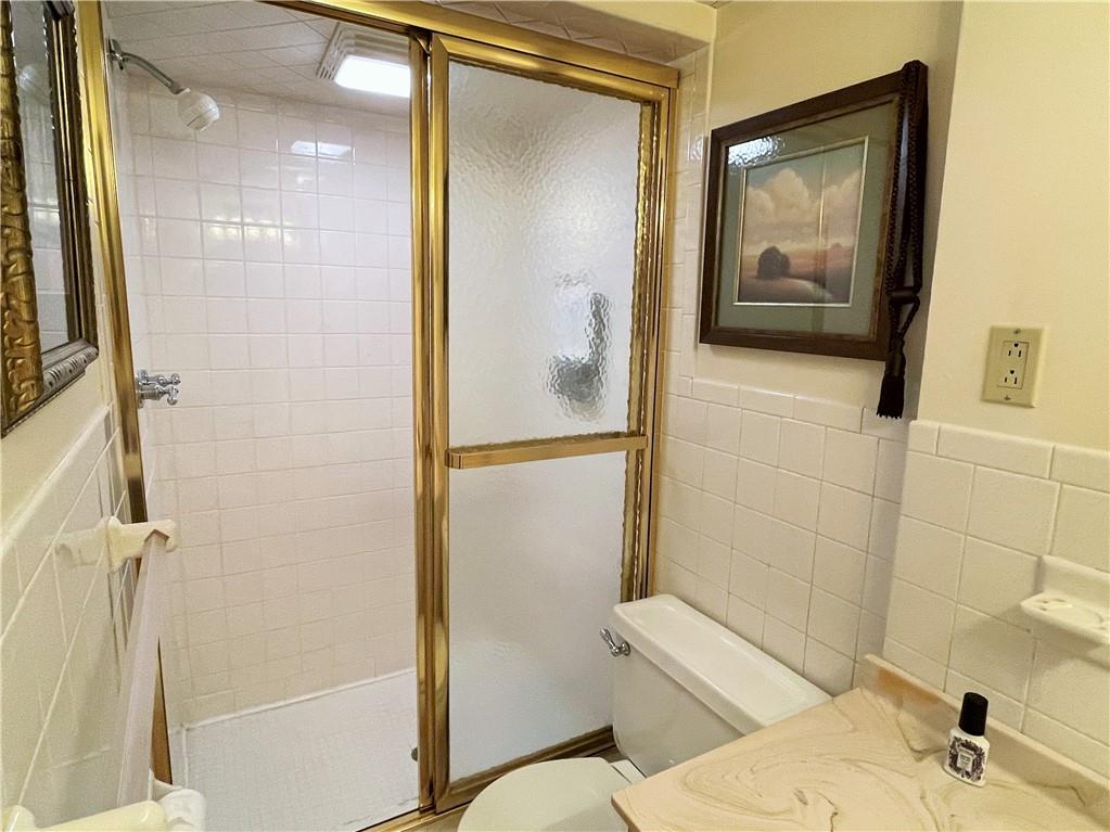 2310 North Forest Grove Road Coraopolis, PA 15108 - Photo 32 of 50 a bathroom with a sink and a mirror