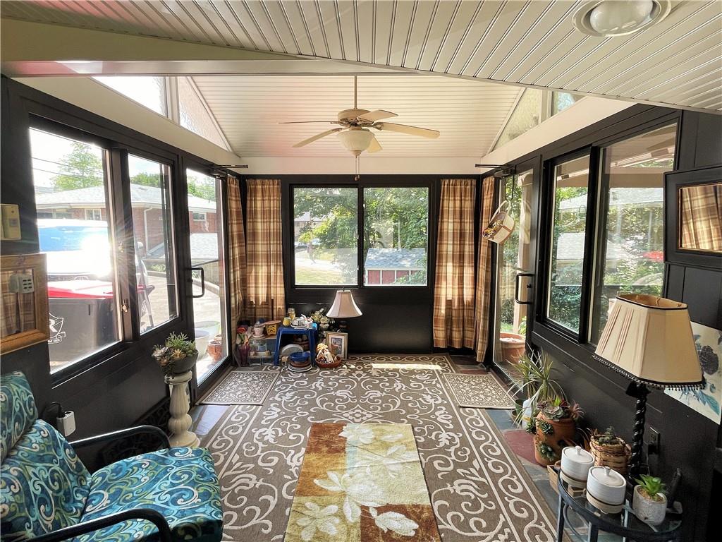 2310 North Forest Grove Road Coraopolis, PA 15108 - Photo 41 of 50 a living room with furniture and a floor to ceiling window