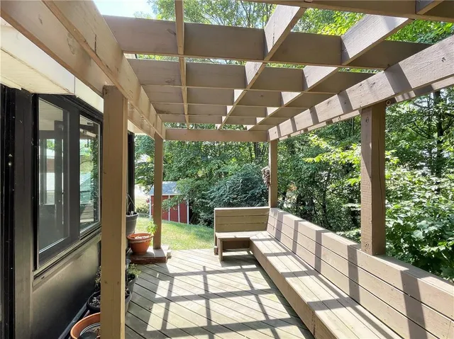 a view of backyard with large trees